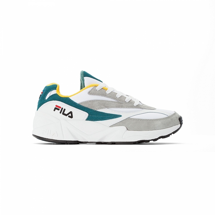 white and gold fila shoes
