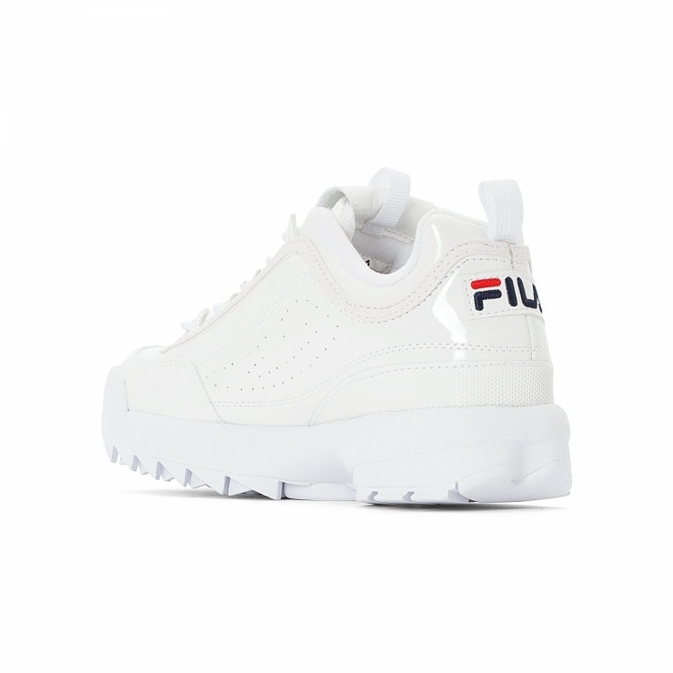 white shiny fila trainers