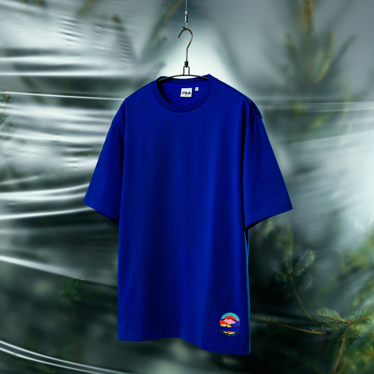 red and blue fila shirt