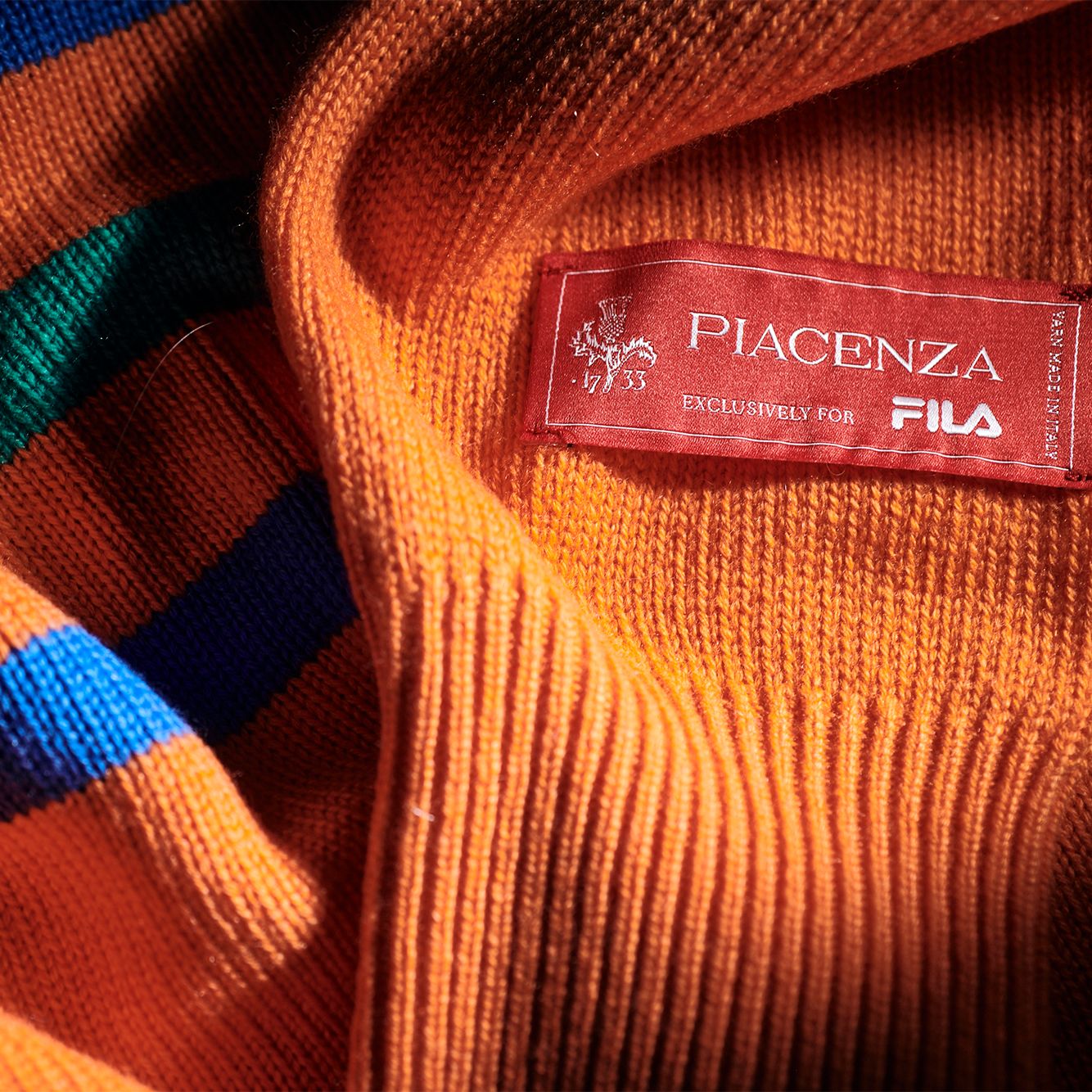 Orange fila sweater discount